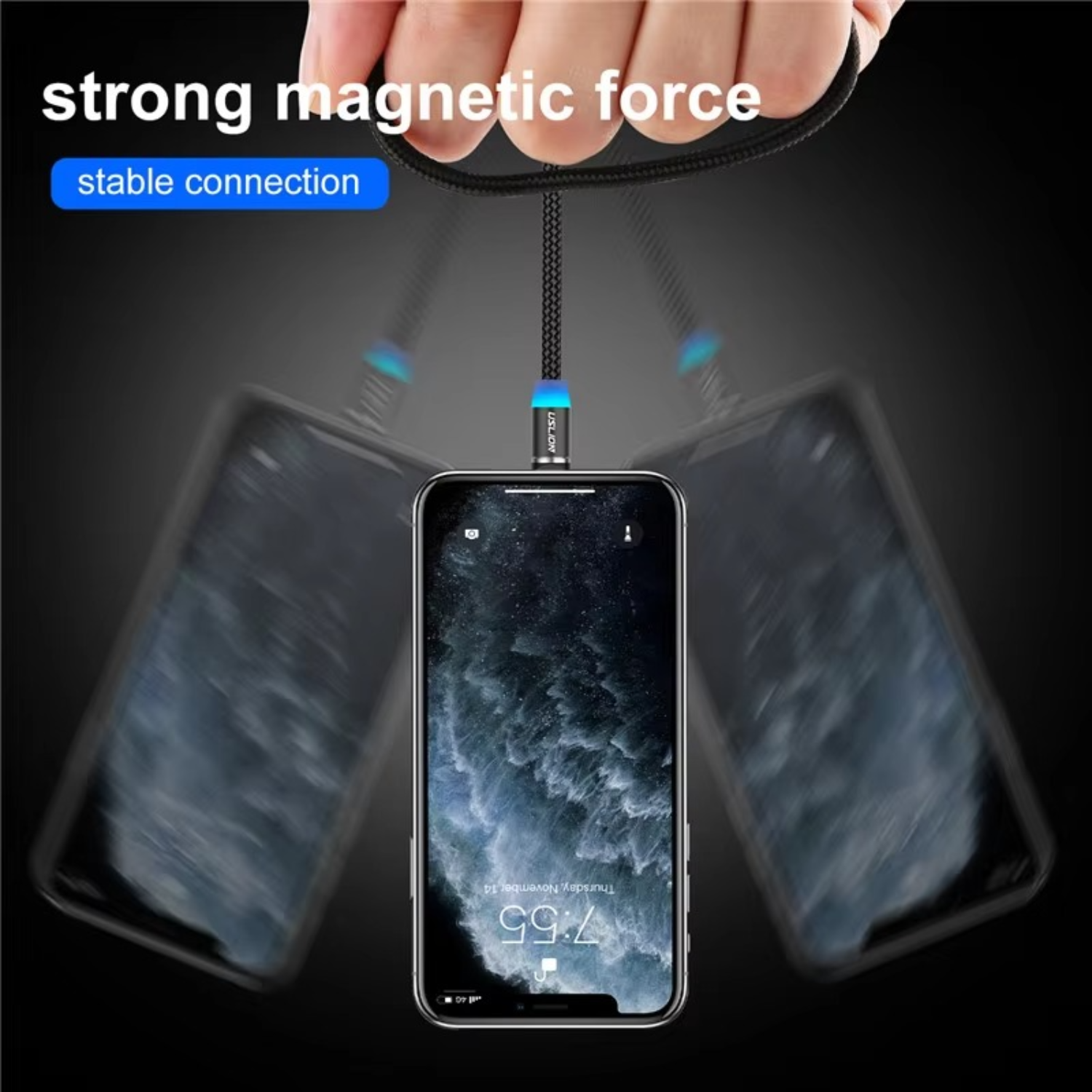 Smartphone with a magnetic cable attachment on a dark background.
